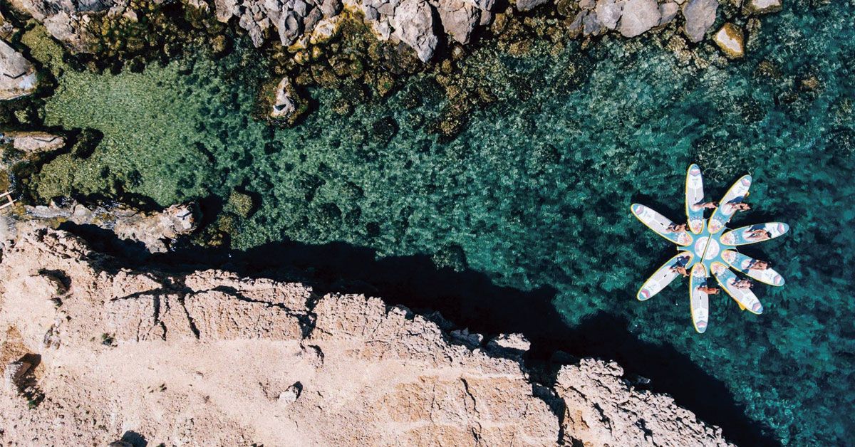 SUP Yoga Ibiza en Cala Vedella
