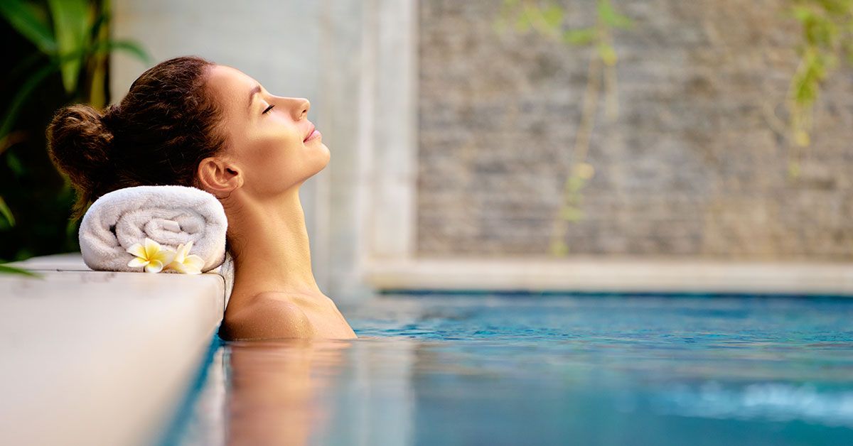 A woman enjoying a health tourism package in Ibiza.