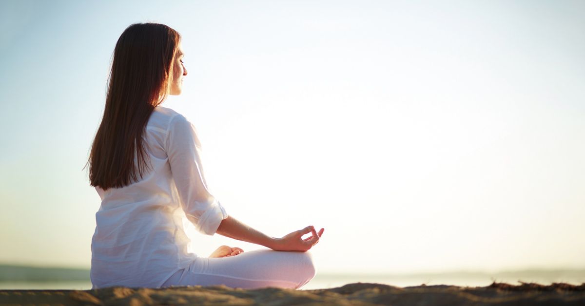 Woman meditating on the last day of the year
