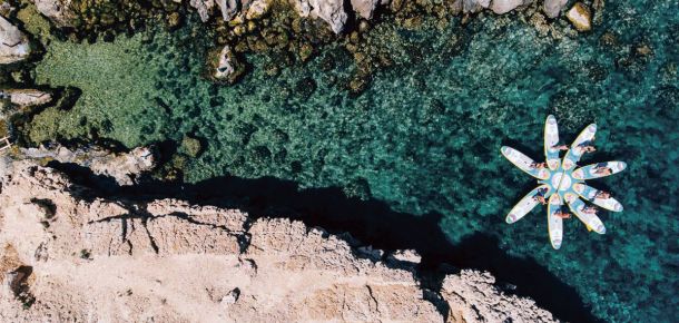 SUP Yoga Ibiza: conexión con tu cuerpo y el mar